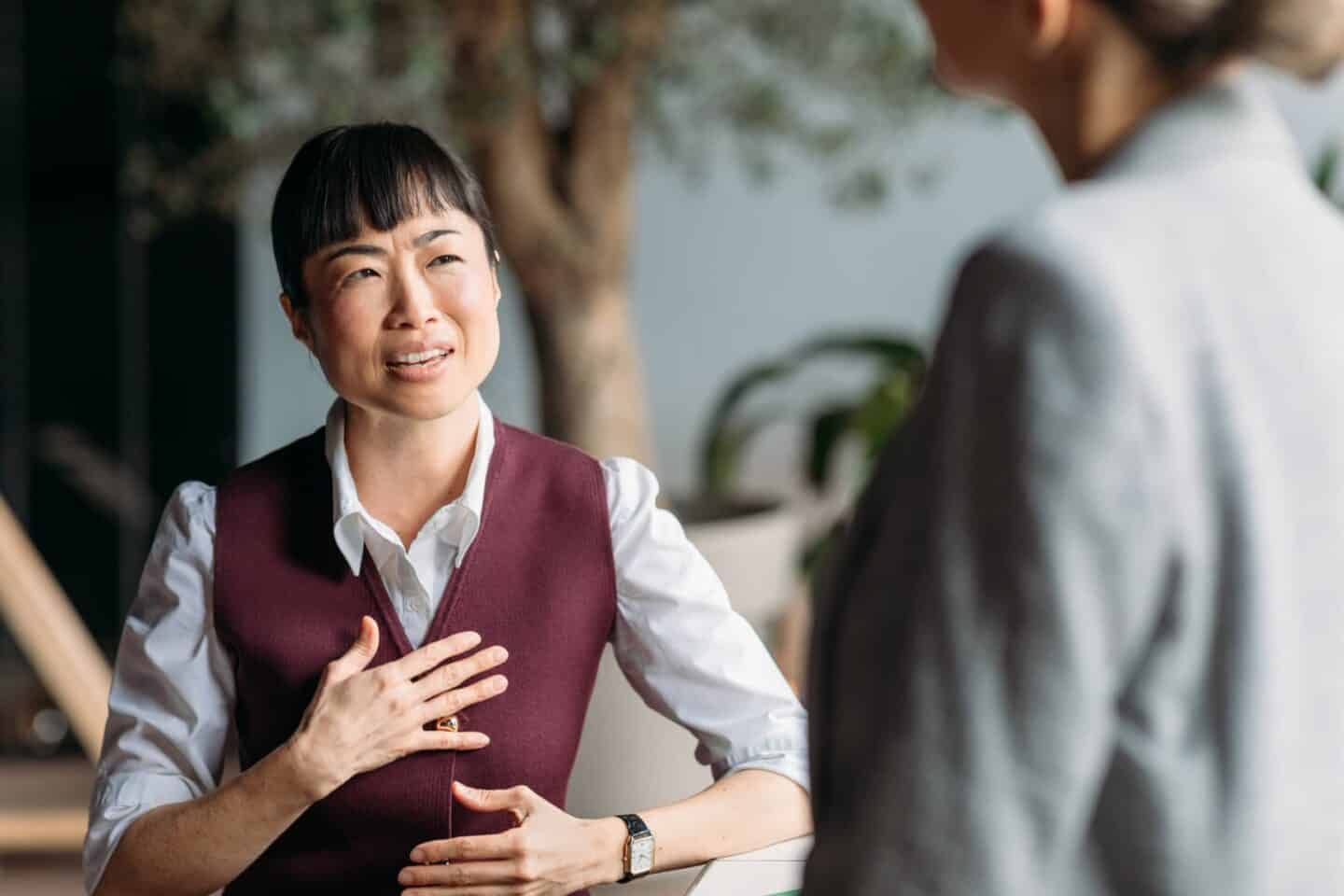 Female colleagues communicate during breaks from work